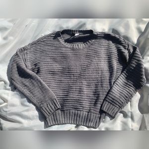 A medium gray knit-like Divided sweater